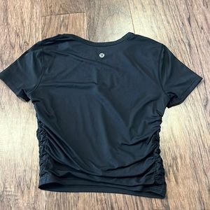 Black swiftly tech with cinched sides